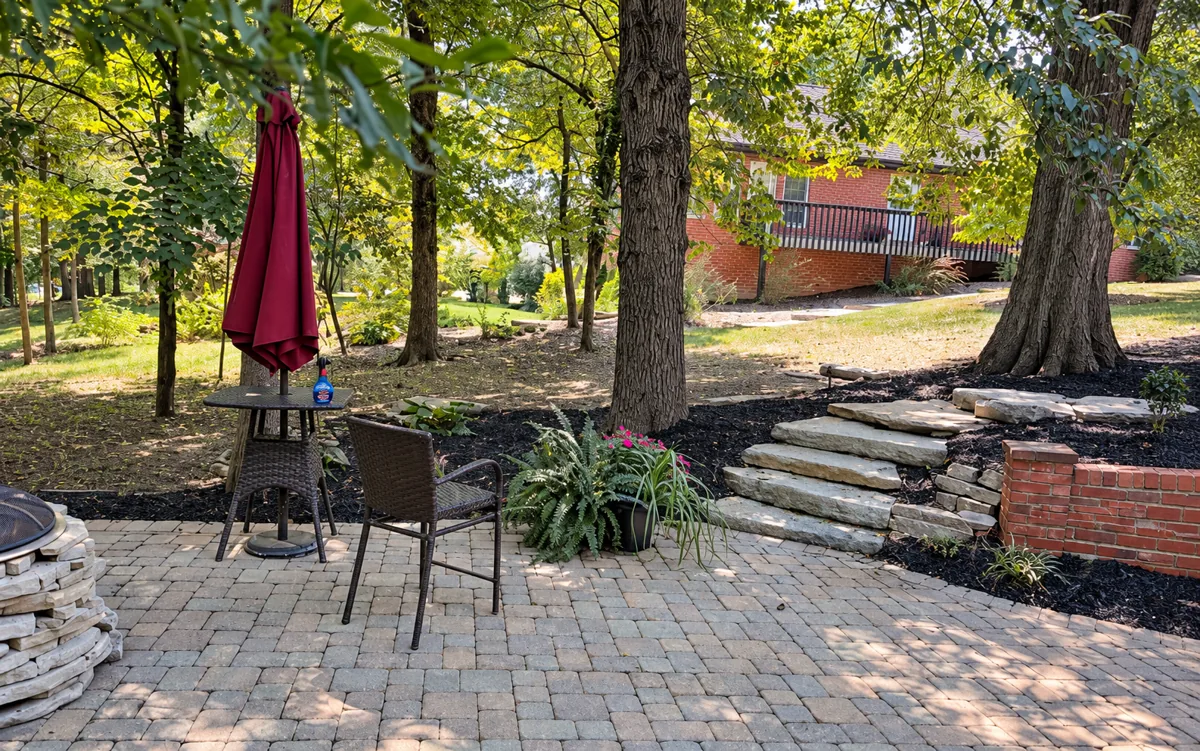 Paver patio and natural stone steps